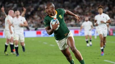 Makazole Mapimpi runs for his try in the Rugby World Cup final. AP Photo