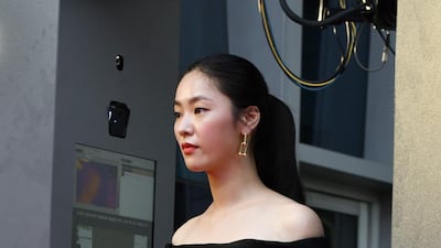 Actress Jeon Yeo-been walks through a thermal camera system on the red carpet of the 56th annual Daejong Film Awards. AFP