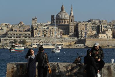 Valletta, including the dome of the Basilica of Our Lady of Mount Carmel, in Sliema, Malta. Sean Gallup / Getty Images