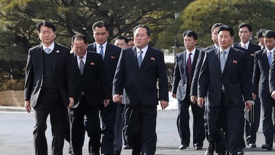 North Korea's chief delegate Ri Son Gwon (C) and delegates leave after meeting with South Korean delegates (not pictured) in the truce village of Panmunjom, North Korea. Jung Ui-chel / EPA