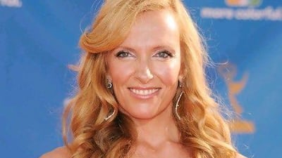 Dec 15 : People crossing the traffic signal near the Lifeline hospital ( golden glass building ) at the corner of Electra Street in Abu Dhabi. Pawan Singh / The National