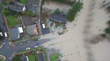 The Snoqualmie River floods over its banks at Riverview Park in Snoqualmie, Wash. AP