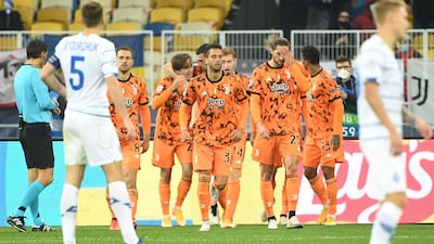 Alvaro Morata celebrates with teammates after scoring Juventus' second goal in their 2-0 Champions League win at Dynamo Kiev on Tuesday, October 20. AFP