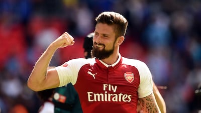 Arsenal's Olivier Giroud celebrates after winning the Community Shield. Joe Giddens / PA