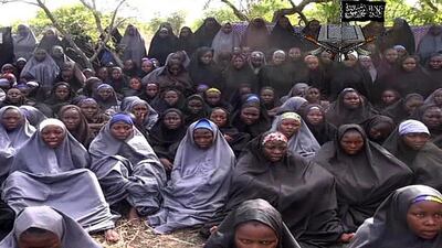 A screengrab from a video of Nigerian Islamist extremist group Boko Haram, obtained by AFP, shows some of the kidnapped girls wearing the full-length hijab and praying in an undisclosed rural location. The group's leader, Abubakar Shekau, claims the girls had converted to Islam and would not be released until all militant prisoners were freed. AFP Photo