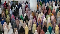 TOPSHOT - Muslim women offer Tarawih, the first prayers marking the start of the Islamic holy fasting month of Ramadan at Al Akbar mosque in Surabaya on February 18, 2026. (Photo by JUNI KRISWANTO / AFP)