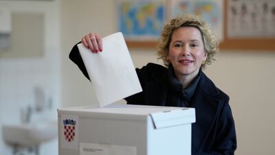 Ivana Kekin, left-green candidate of the "We Can" party, casts her ballot in Zagreb. AP