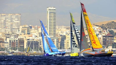 Team Vestas Wind, left, Team Brunel, centre, and Abu Dhabi Ocean Racing compete during Saturday's in-port race for the Volvo Ocean Race. Jose Jordan / AFP