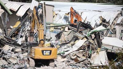 Israeli excavators demolish buildings inside the headquarters of the UN agency for Palestinian refugees, in occupied East Jerusalem. AFP