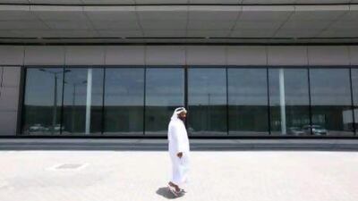 A work in progress: Ahmed Salem Al Mansoori checks on the status of his dealership’s new air-conditioned showroom at Motor World near Abu Dhabi airport last week.