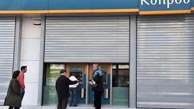 Depositors have been withdrawing their money from Cypriot banks in the past few days. Louisa Gouliamaki / AFP