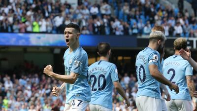 Phil Foden, left, proved Manchester City's match-winner against Tottenham Hotspur on Saturday. EPA