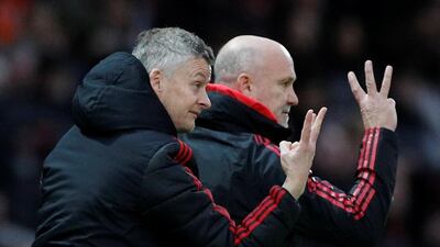 Manchester United interim manager Ole Gunnar Solskjaer and assistant manager Mike Phelan. Reuters