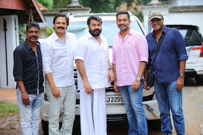 Mohanlal, centre, praised the work of co-star Vivek Oberoi, left, and debut director Prithviraj Sukumaran. Courtesy Sinat