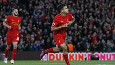 Liverpool's Philippe Coutinho celebrates scoring their second goal against West Brom on Saturday. Ed Sykes / Reuters