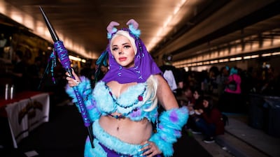 An attendee dressed as an Ewok from 'Star Wars' poses during New York Comic Con. AP