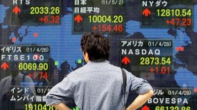 Japan's Nikkei 225 index closed above 10,000 for the first time since mid-March on Monday on optimism that Wall Street shares would rally. Koji Sasahara / Associated Press