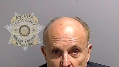 This booking photo provided by the Fulton County Sheriff's Office shows Rudy Giuliani on August 23 in Atlanta, after he surrendered. AP