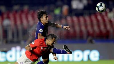 Alexis Sanchez heads in Chile's third goal, his first for five months. EPA