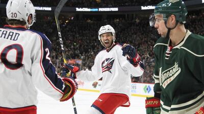 Columbus Blue Jackets left wing Brandon Saad and defenceman Seth Jones celebrate a goal. Andy Clayton-King / AP