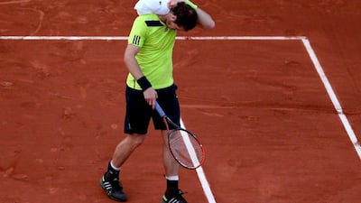 Andy Murray reacts during his match against Philipp Kohlschreiber before its suspension on Saturday. Matthew Stockman / Getty Images / May 31, 2014