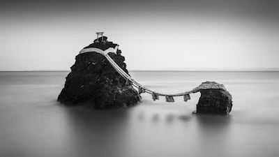 The landscape category winner was 'The Wedded Rocks' by Robert Bolton, taken in Meoto Iwa, Japan. Photo: Robert Bolton / Black and White Photo Awards