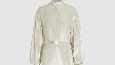 Woman in white: Regency lamé maxi dress by Osman; Dh4,460. Courtesy The Modist