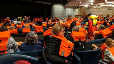 This photo provided by Michal Stewart shows passengers on board the Viking Sky, waiting to be evacuated. Michal Stewart via AP