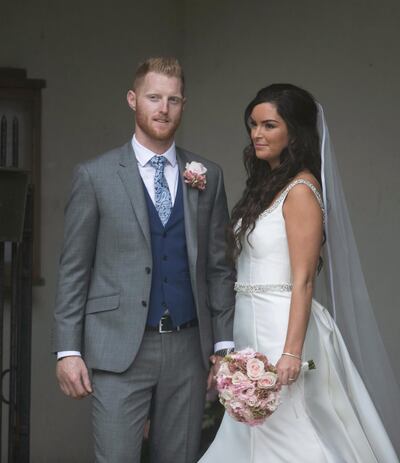 Ben Stokes poses with his bride Clare outside St Mary the Virgin church in East Brent, England, on Saturday. Steve Parsons / AP Photo
