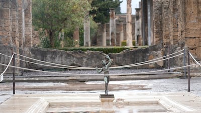 A statue of a Faunus. In a few horrible hours, Pompeii went from being a vibrant city to a dead one, smothered by a furious volcanic eruption in 79AD.