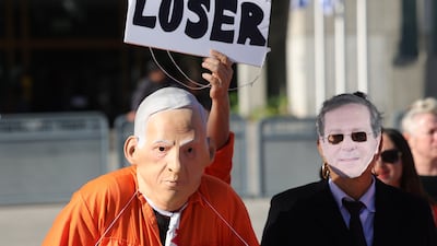 Protesters dressed as Israeli Prime Minister Benjamin Netanyahu and President Isaac Herzog protest after Netanyahu's pardon request at the Tel Aviv Magistrate's Court. EPA