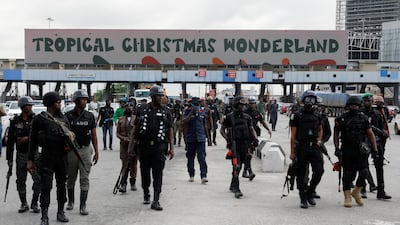 Policemen patrol during the rally marking the anniversary of when security forces fired live rounds into a crowd at the Lekki toll gate. Reuters