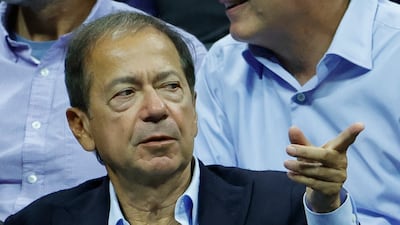 American billionaire hedge fund manager John Paulson takes in the Kyrgios v Khachanov match. EPA