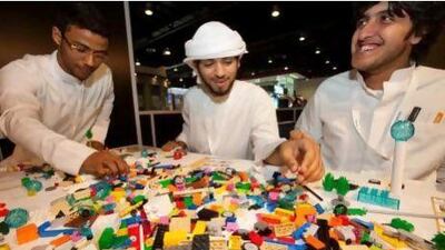 Job hunters build figures with Lego blocks at this week's Careers UAE exhibition to help them discover their strengths. Jaime Puebla / The National