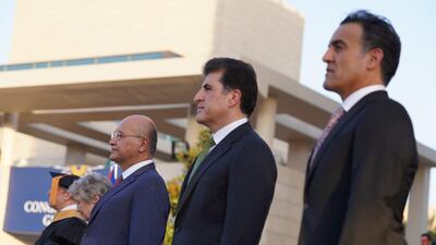 Speakers and university officials attend the ceremony. Photo: Iraqi President's Office