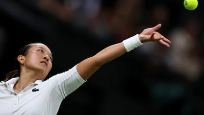 Harmony Tan serves against Serena Williams. Getty Images