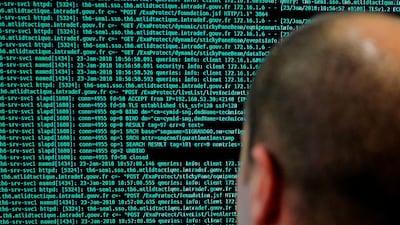 A solider watches code lines on his computer at the French defence ministry. Police in Europe and North America have seized servers and data from ISIS propaganda outlets in a multi-country operation, Europol announced on April 27, 2018. Michel Spingler / AP Photo