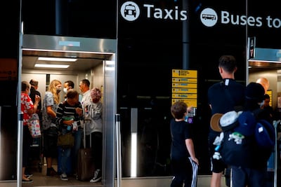 Newly-arrived passengers are told to not use taxis or public transport. AFP