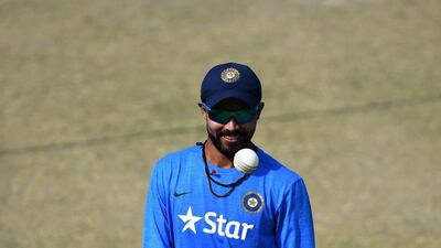 India's Ravindra Jadeja tosses a ball during a training session on Saturday during the 2016 World Twenty20 tournament. Money Sharma / AFP / March 26, 2016