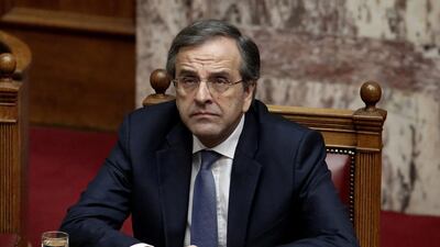Antonis Samaras, Greece's prime minister, looks on while attending parliament during the final vote for a new president in Athens, Greece, on Monday, Dec. 29, 2014. Greece faces snap elections next month after Samaras failed in his third and final attempt to persuade parliament to back his candidate for head of state. Photographer: Kostas Tsironis/Bloomberg *** Local Caption *** Antonis Samaras
