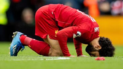 Liverpool's Mohamed Salah celebrates after scoring his team's first goal against Bournemouth. EPA