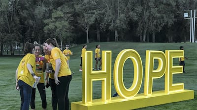 Participants hug each other after the event.