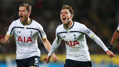 Christian Eriksen of Tottenham Hotspur celebrates scoring the winning goal with Jan Vertonghen during the Barclays Premier League match between Hull City and Tottenham Hotspur at KC Stadium on November 23, 2014 in Hull, England. Alex Livesey/Getty Images