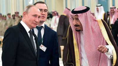 Mr Putin and King Salman talk during their meeting. Kremlin Pool Photo via AP