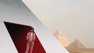 French street artist JR with his installation 'Inside out Giza' near the Pyramids. EPA