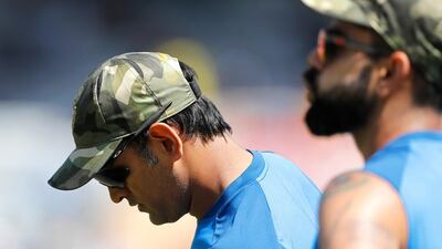 India captain Virat Kohli, right, and teammate MS Dhoni are two of the biggest stars in world cricket at the moment. Aijaz Rahi / AP Photo