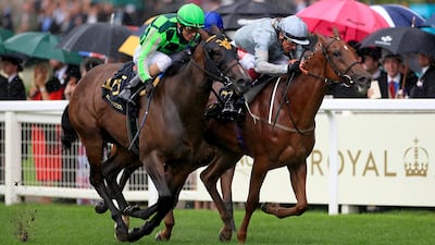 Raffle Prize, ridden by jockey Frankie Dettori, right, on his way to winning the Queen Mary Stakes. Press Association