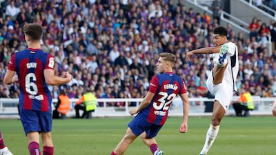 Real Madrid's Jude Bellingham scores their first goal. Reuters
