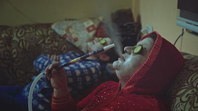 Aisha Amayrah, seen with her daughter, supports her family after being widowed. Courtesy Kloos & Co