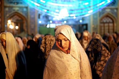 Iranian women during evening prayers in northern Tehran. AP